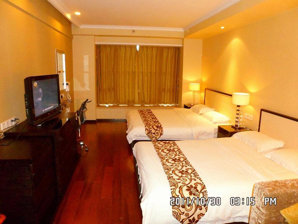 Guangzhou Meiyijia Hotel Apartment - Zhujiang Xinan Branch Quarto foto